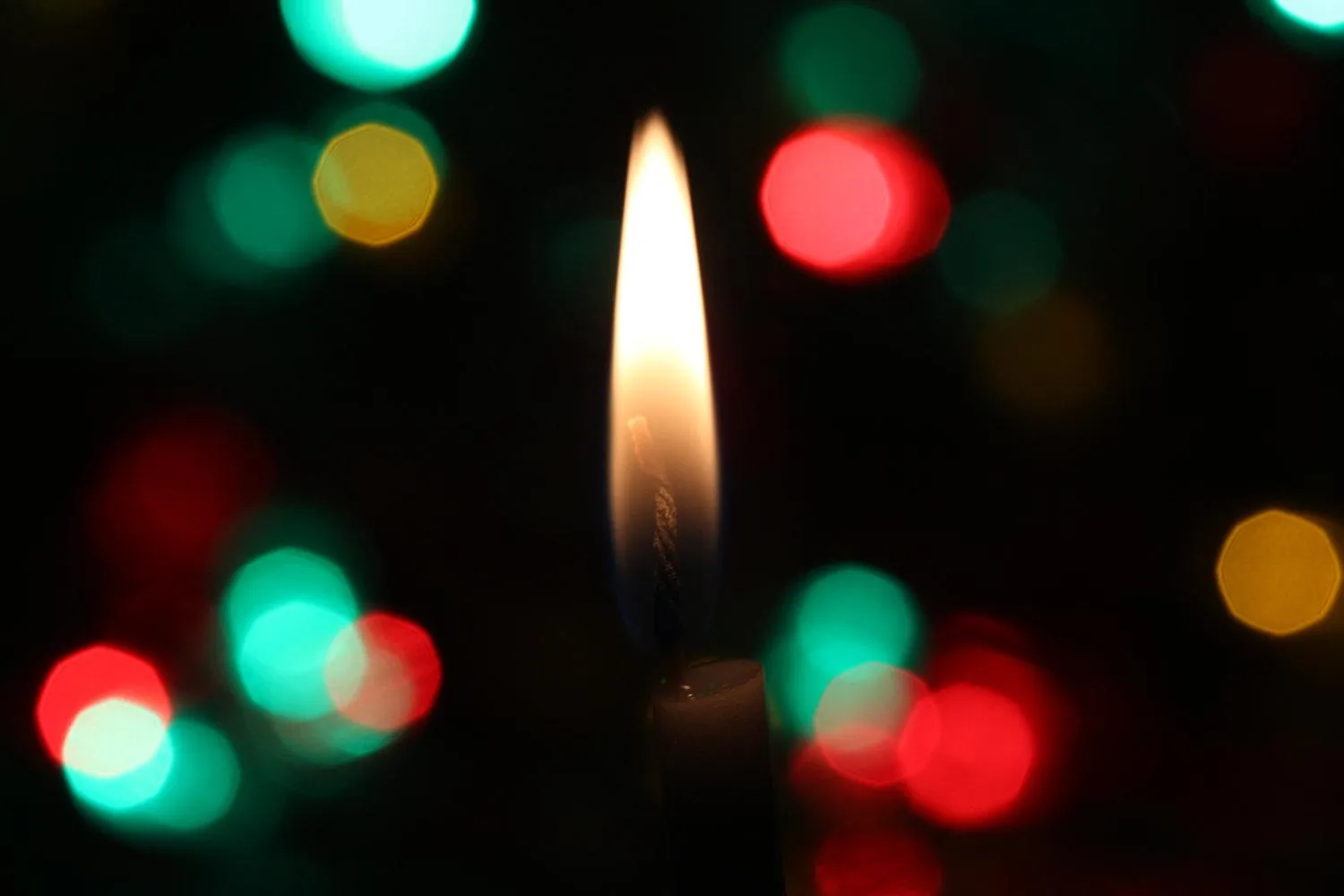 Advent wreath with lit candles marking the Christmas season
