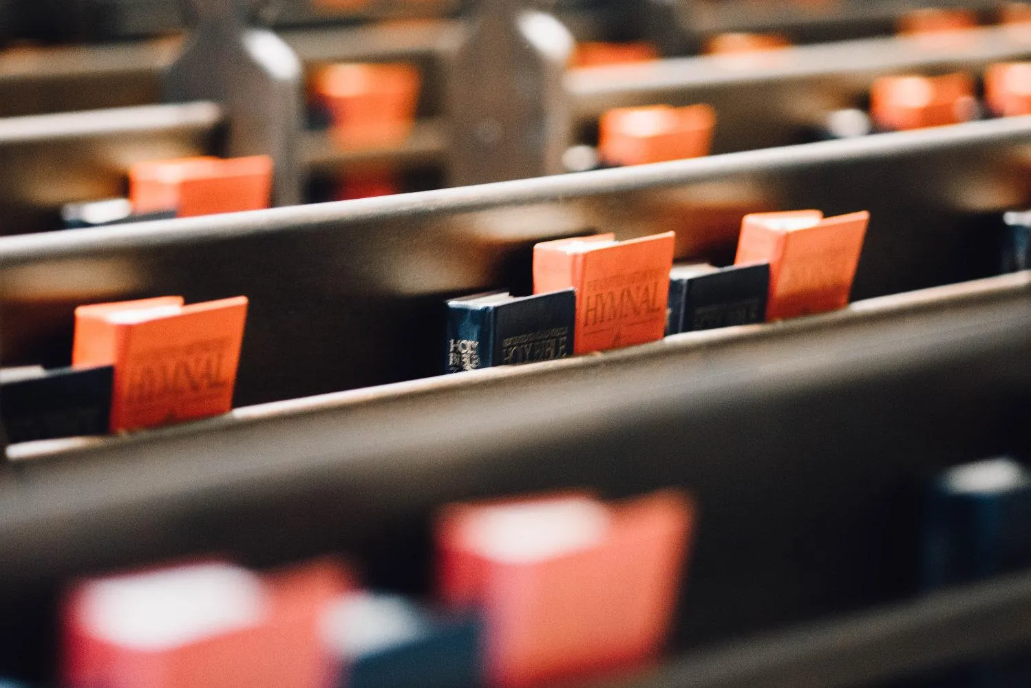 Empty pew with just a Bible, no notebook, during a sermon